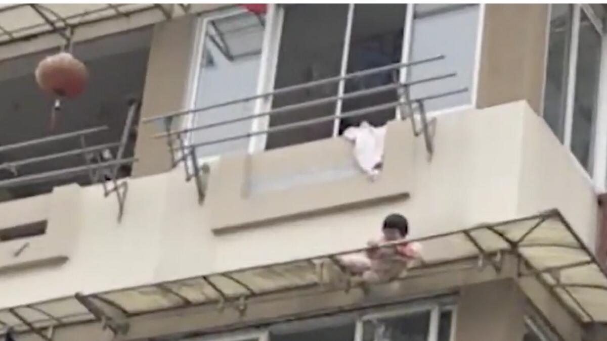 Video: 3-year-old falls out of window, rescued by shopkeeper 