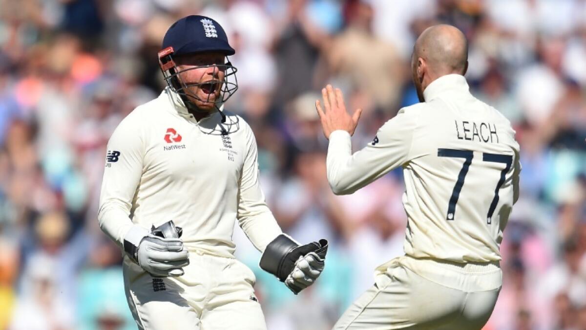 Jonny Bairstow (left) wants to win back his place as wicketkeeper in the England Test team. - AFP file