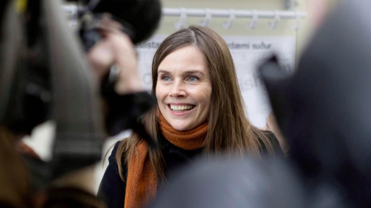 Iceland's Prime Minister Katrin Jakobsdottir speaks to the media after voting at a polling station in Reykjavik. — AP