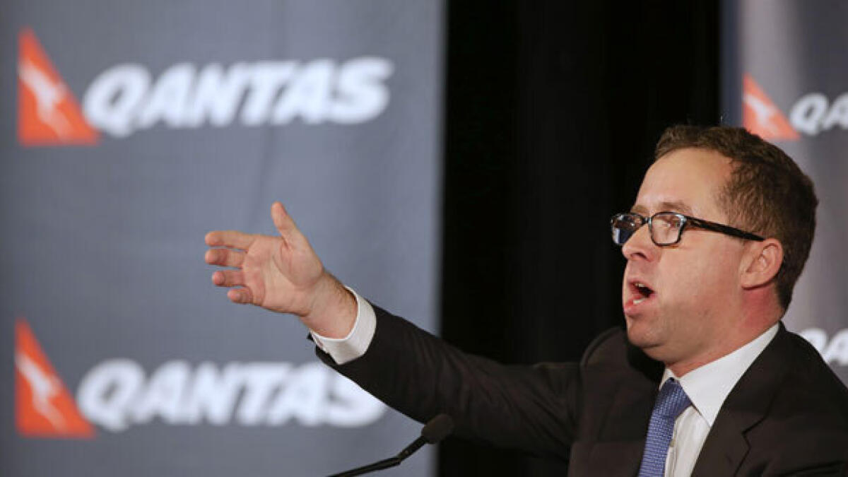 Qantas to cut 5,000 jobs, posts $211 million loss