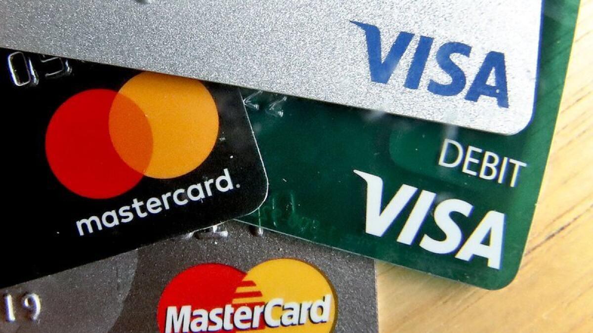 As cardholders experience financial difficulties due to Covid-19, some credit card issuers are promoting their hardship programmes. - AP