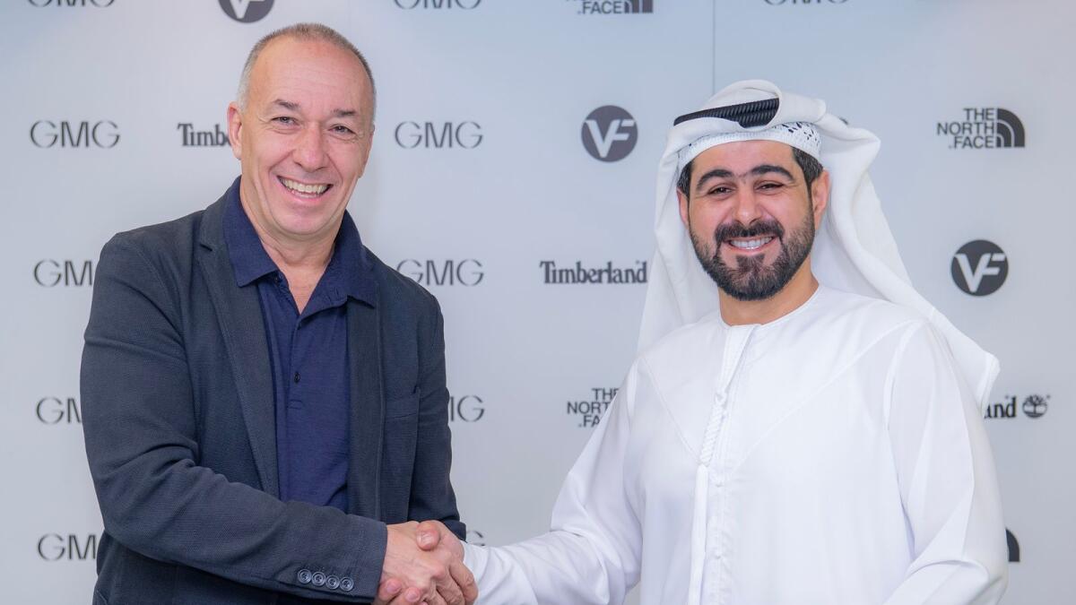 VF Corporation's Martino Scabbia Guerrini and GMG's Mohammad A. Baker sign partnership agreement. — Supplied photo