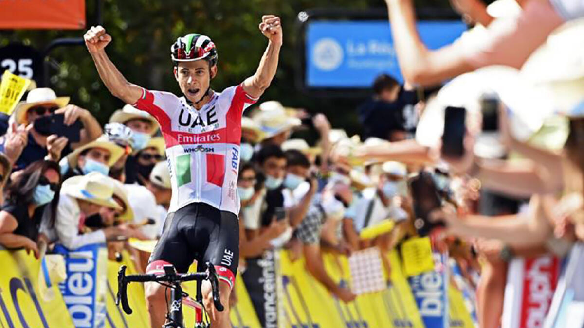 UAE Team Emirates' Davide Formola celebrates after winning stage three of the Criterium du Dauphine. -- Supplied photo