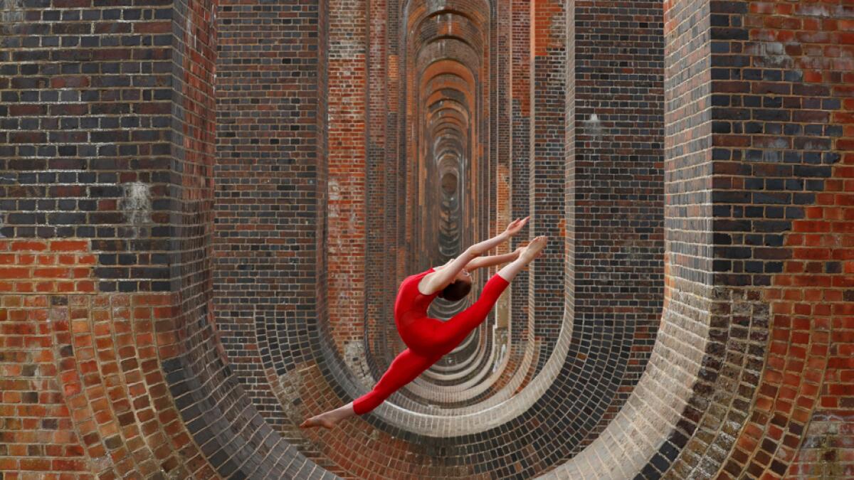 Former Team GB Rhythmic Gymnastic star and dancer Hannah Martin during a training session at Ouse Valley Viaduct, following the outbreak of the coronavirus disease, Sussex, Britain. Photo: Reuters