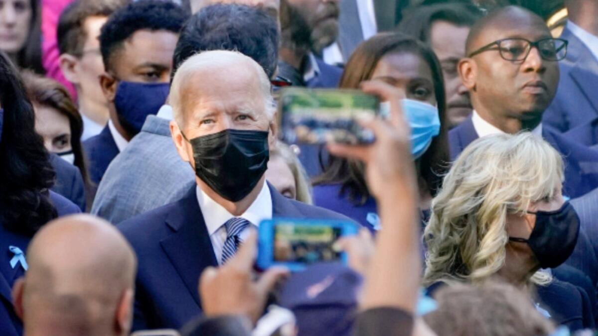 US President Joe Biden and first lady Jill Biden arrive at the National September 11 Memorial in New York. — AP