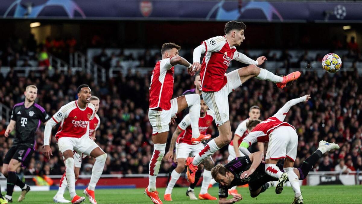 Arsenal is top of the Premier League table on goal differential over Liverpool and by a point more than Manchester City. - AFP File