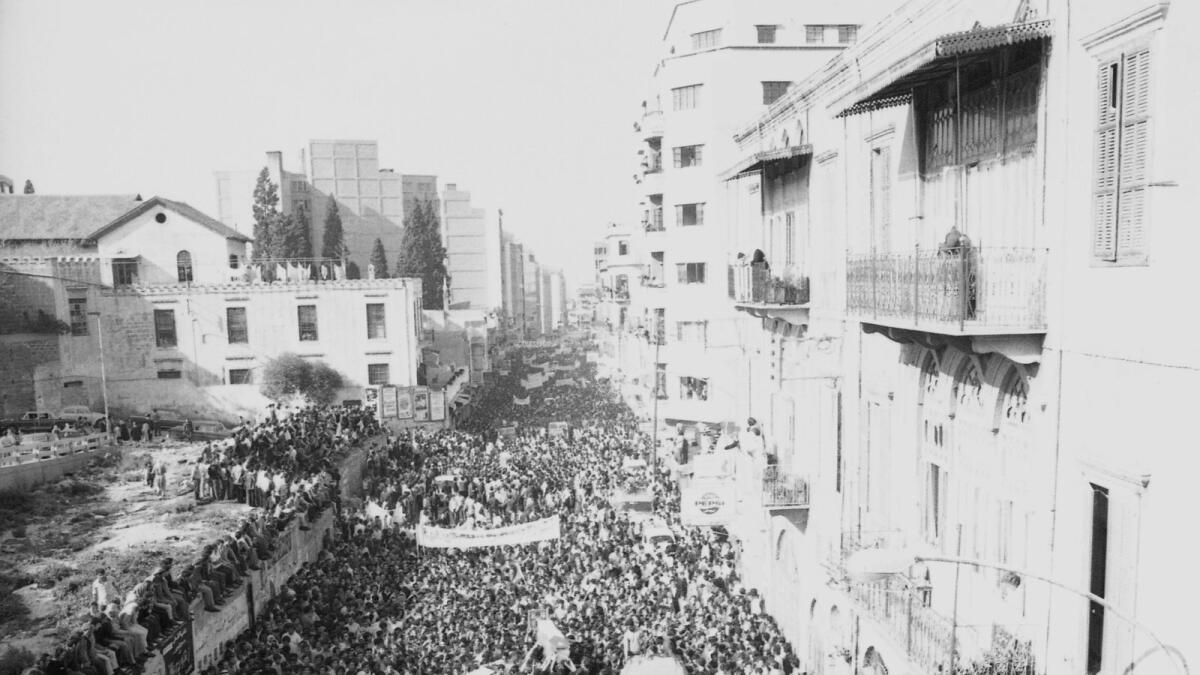 A sea of mourners follows the funeral procession for the slain Palestinian leaders in Beirut on April 12, 1973, who were killed in Israeli raid on April 10. — AP
