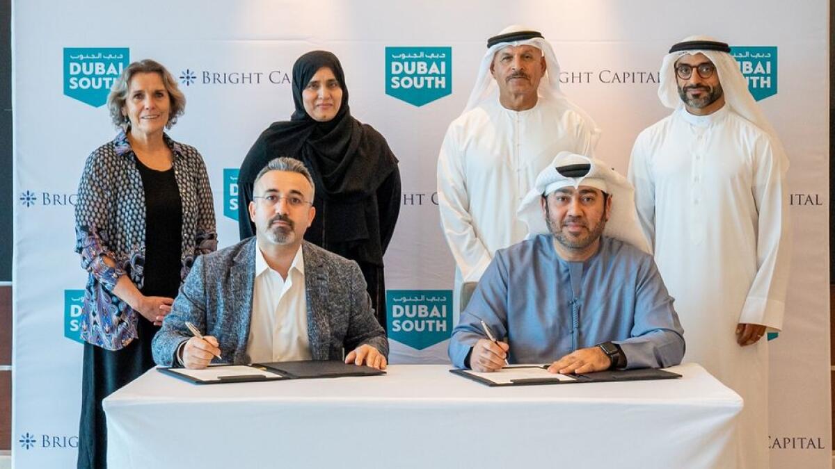 Khalifa Al Zaffin, executive chairman of Dubai Aviation City Corporation and Dubai South, and Esref Temel, managing director of Bright Capital Investment, signed the agreement. — Supplied photo