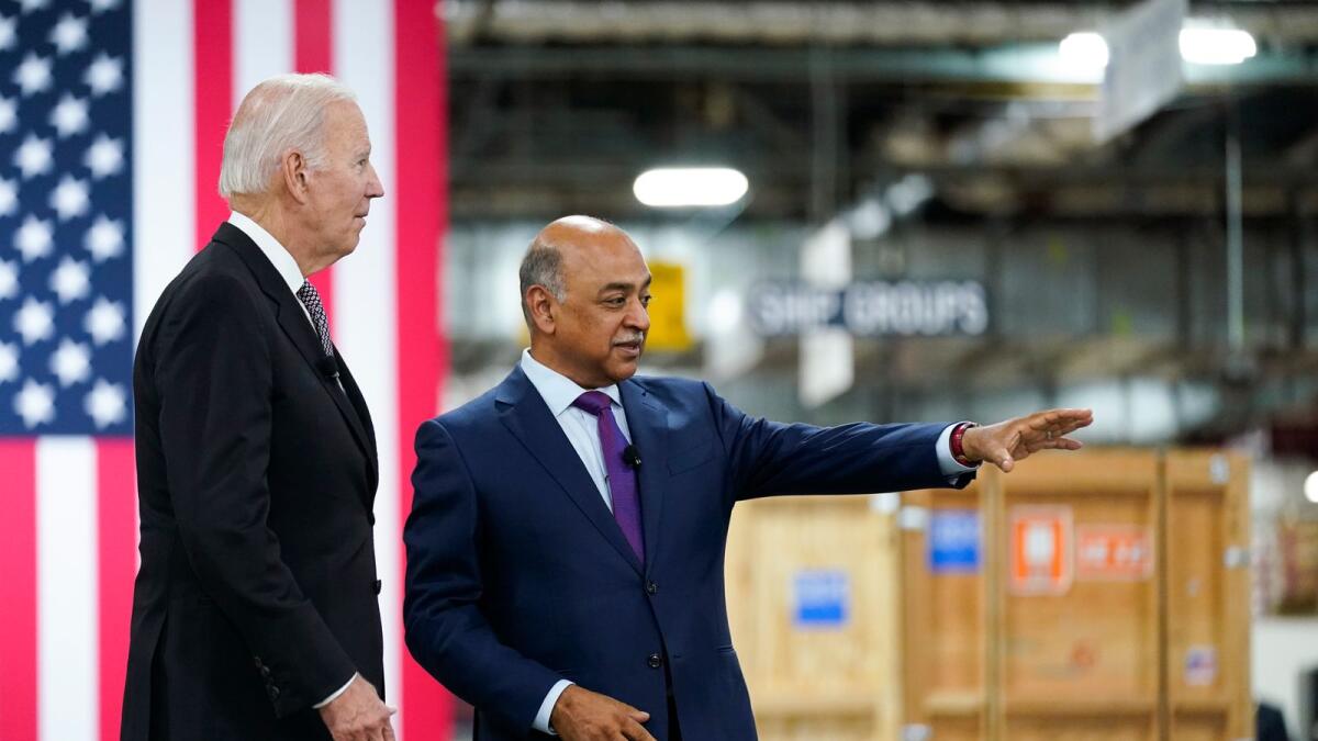 President Joe Biden listens as IBM Chairman and CEO Arvind Krishna speaks during a tour of an IBM facility in Poughkeepsie, New York last year. — AP