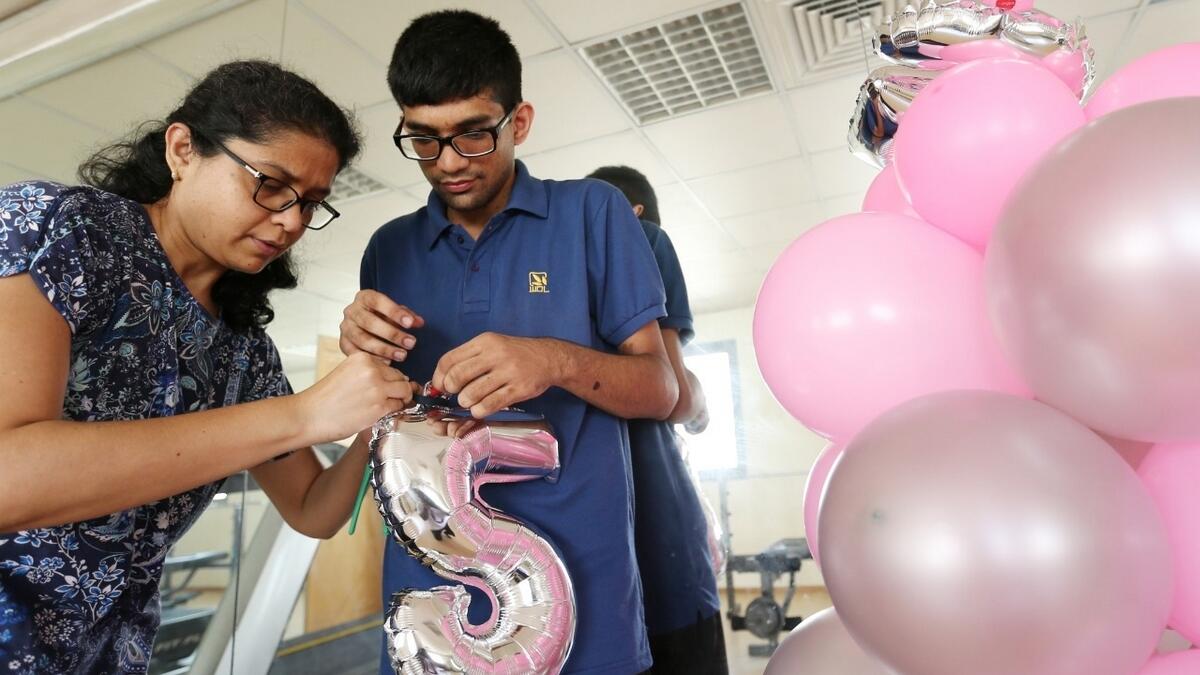 Autistic youth, balloon decorations, not enough, sustain family, Dubai
