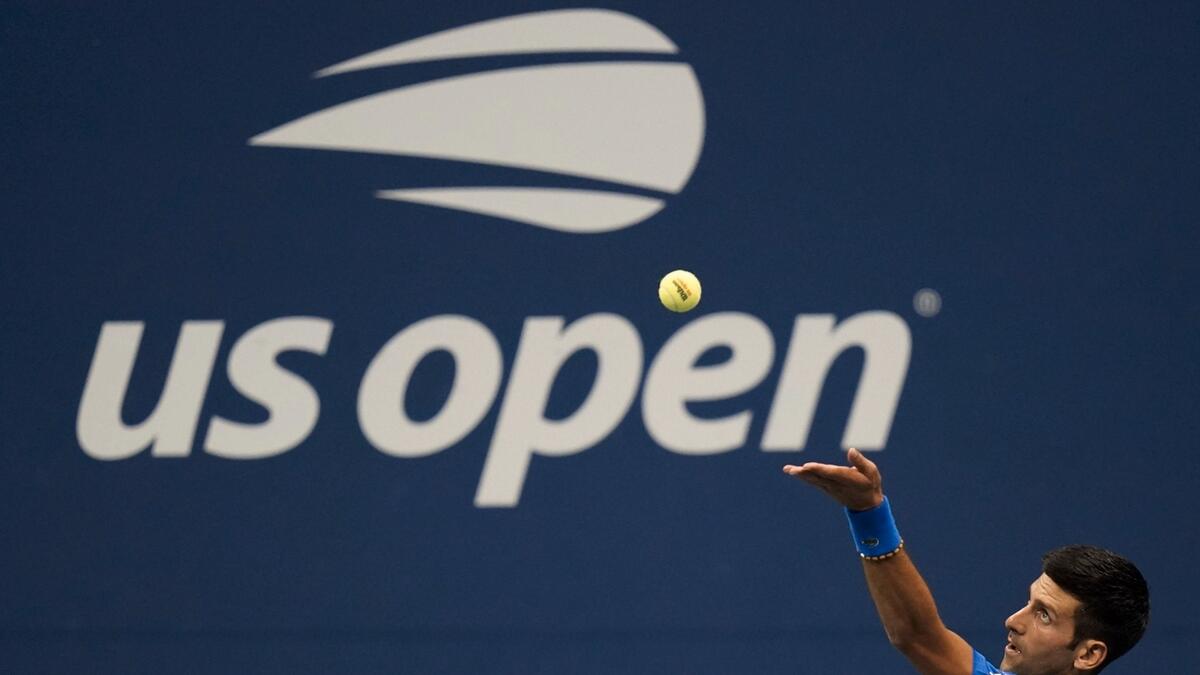 Novak Djokovic, of Serbia, serves to Damir Dzumhur, of Bosnia and Herzegovina, during the first round of the US Open tennis championships in New York. Photo: AP