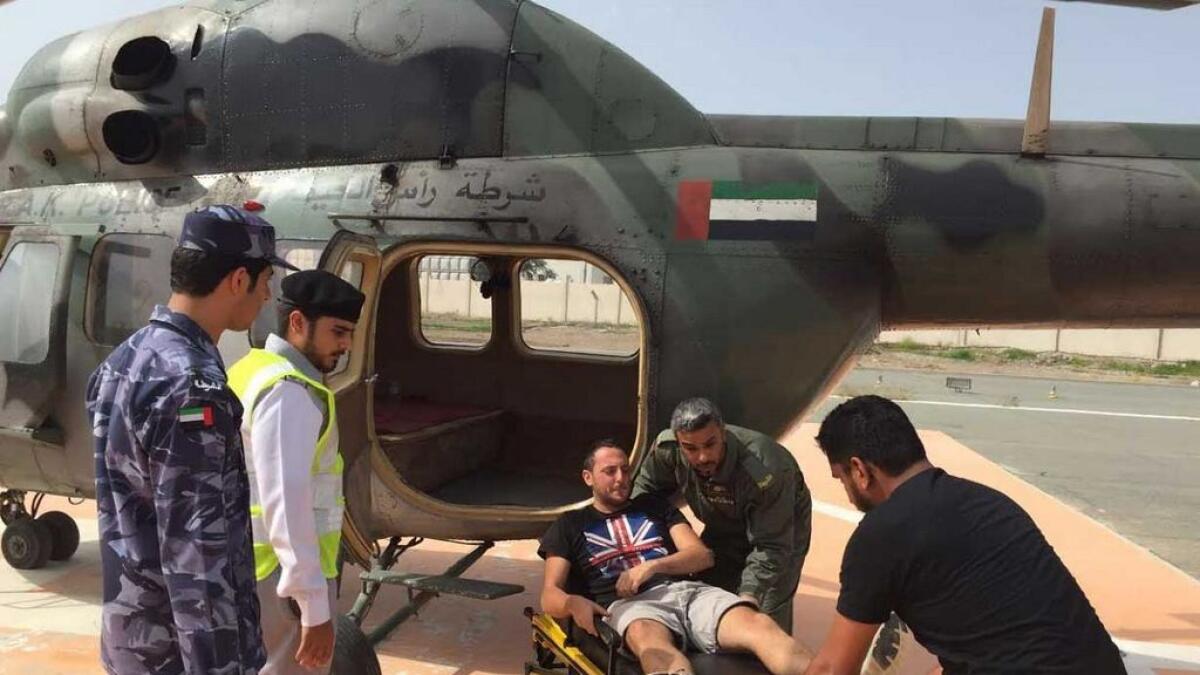  Police rescue Arab climber after he fell of from a RAK mountain. - Supplied photo