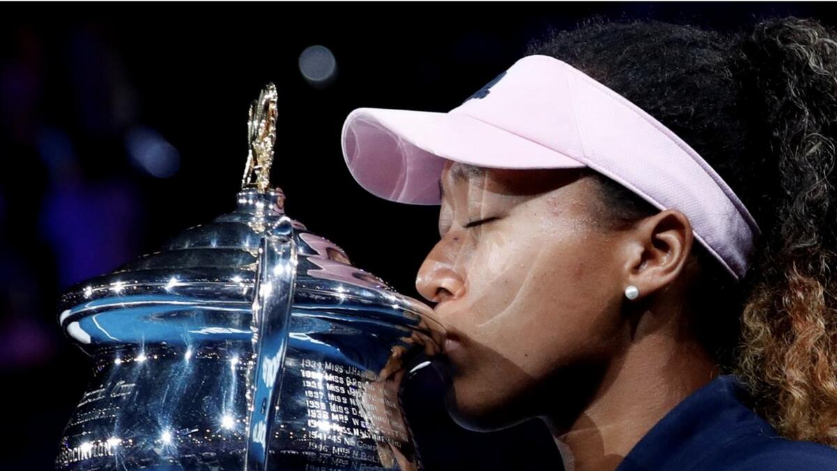 Japan's Naomi Osaka kisses the trophy after winning the 2019 Australian Open final against Czech Republic's Petra Kvitova. - Reuters file