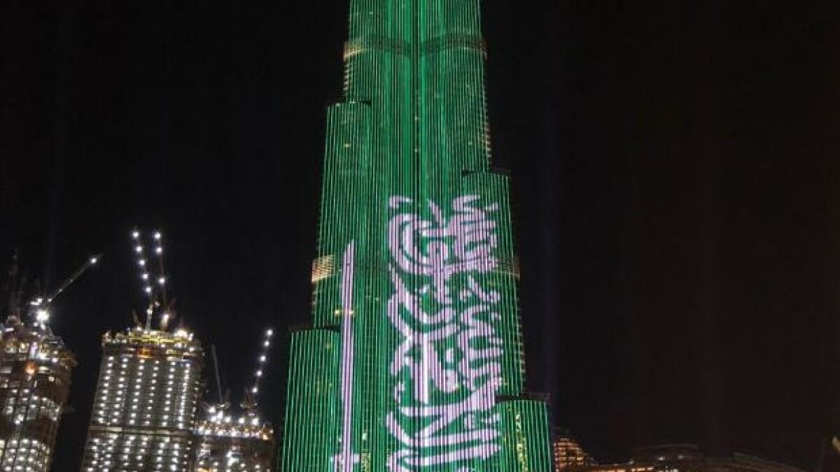 Photo: Dubais Burj Khalifa lights up in colours of Saudi national flag