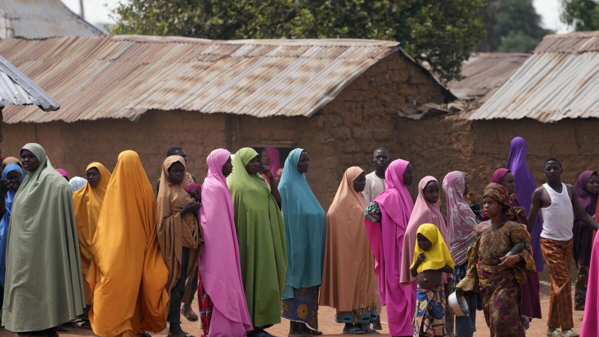Parents wait for news about the kidnapped LEA Primary and Secondary School students in Kuriga, Kaduna. — AP file