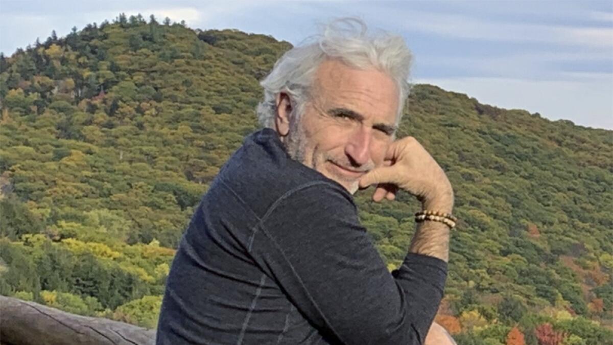 This 2019 photo shows Howard Irwin Fischer in Vermont. Fischer is one supporter who sees human composting as an eco-friendly way to return his remains to the earth as fresh, fertile soil when he dies. — AP