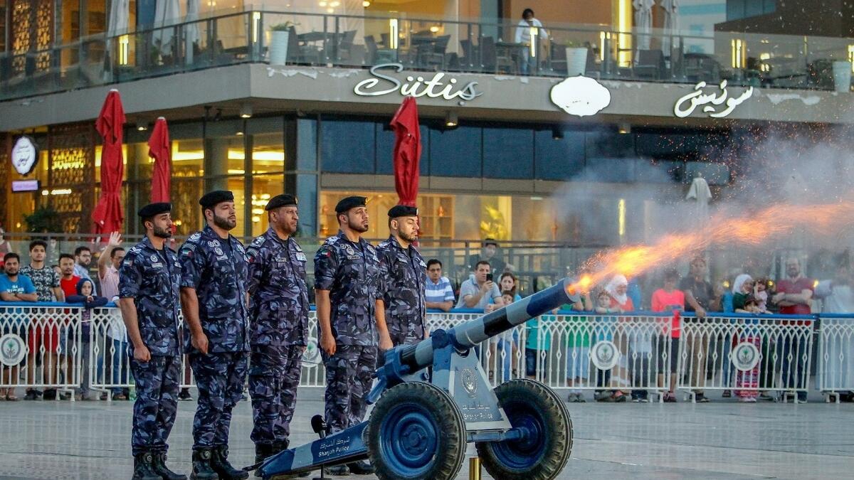 Sharjah Police fire a cannon to announce the first Iftar at Al Majaz Waterfront. (M. Sajjad)