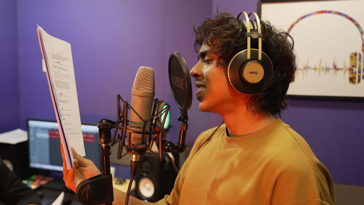 Adarsh Gourav during a reading for the audio series.  Photo: Audible