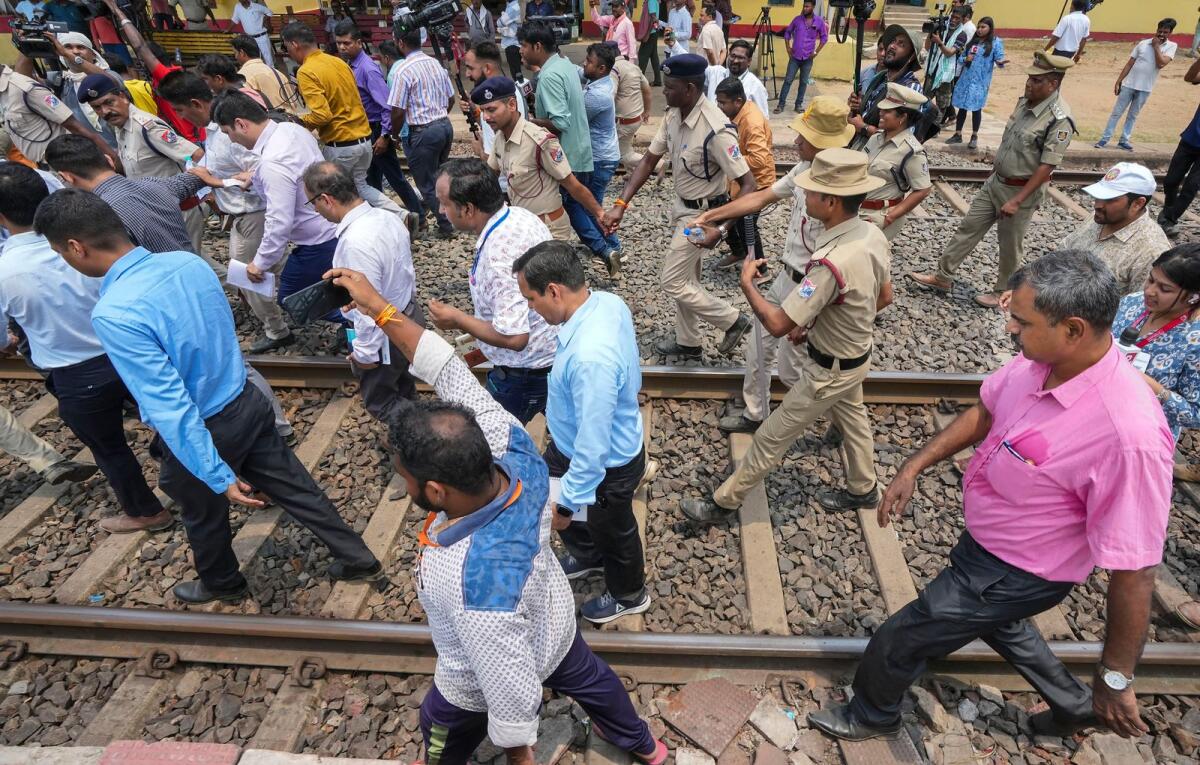CBI officials during the investigation into the triple-train accident, near Bahanga Bazar railway station in Balasore district, Odisha, on Tuesday. Photo: PTI