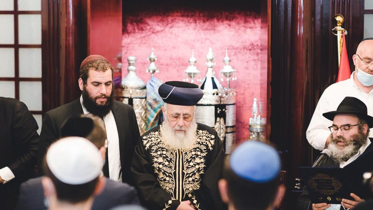 Sephardic Chief Rabbi of the State of Israel, Rabbi Yitzhak Yosef (R) and Rabbi Levi Duchman lead a prayer ceremony during a Jewish meeting to inaugurate the first certified Jewish school in the gulf.- Photo by Neeraj Murali