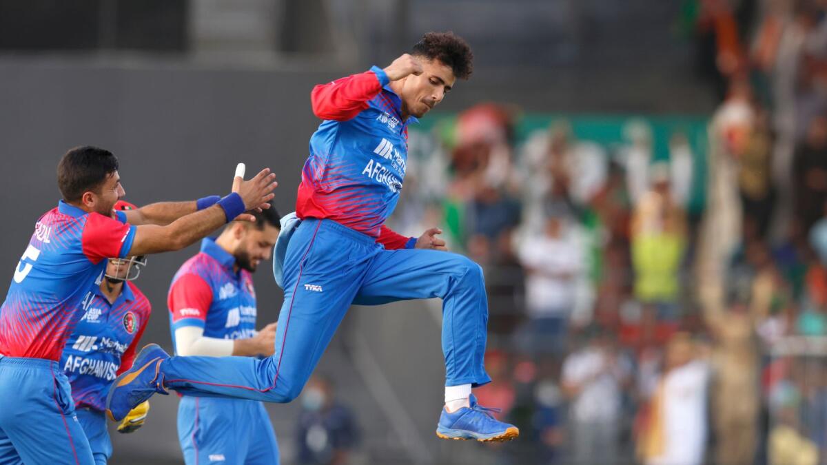 Mujeeb Ur Rahman of Afghanistan celebrates the wicket of Mohammad Naim of Bangladesh. (Asian Cricket Council)