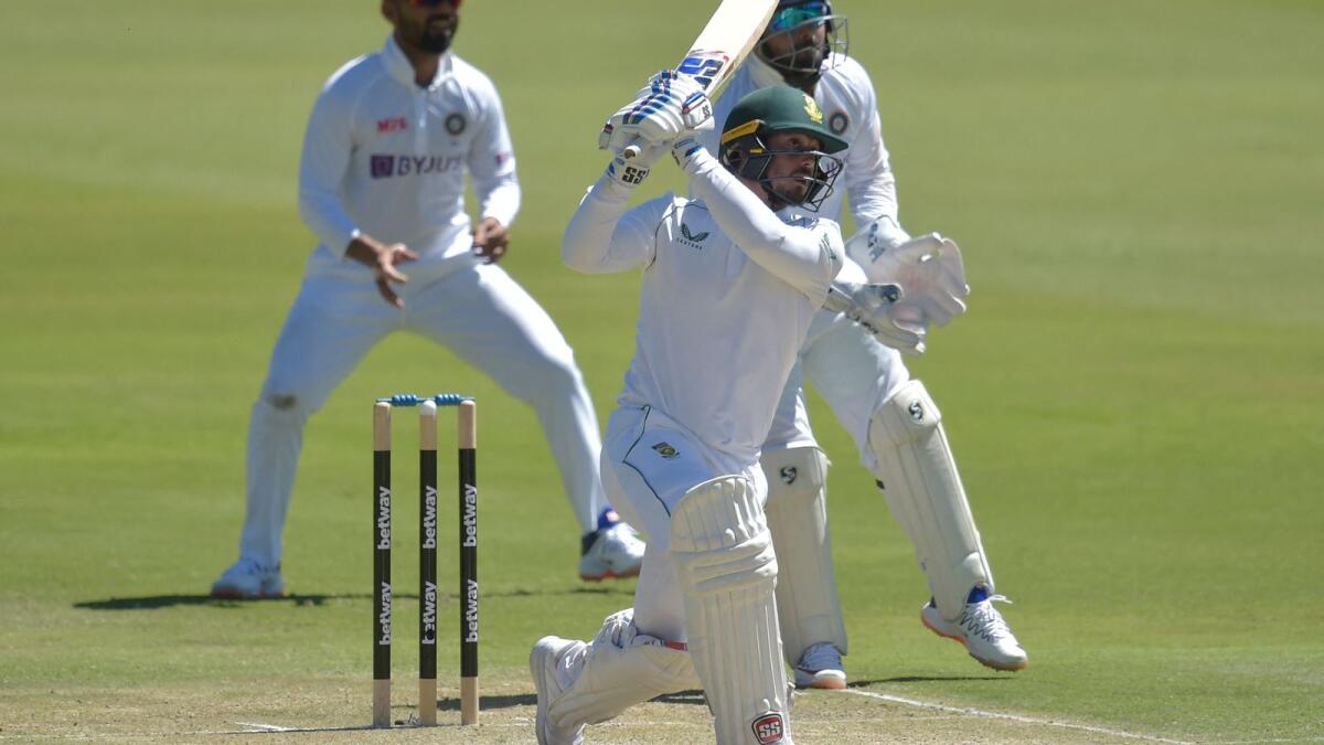 South Africa's Quinton de Kock (centre) hits a six during the third day of the first Test against India. (AFP)