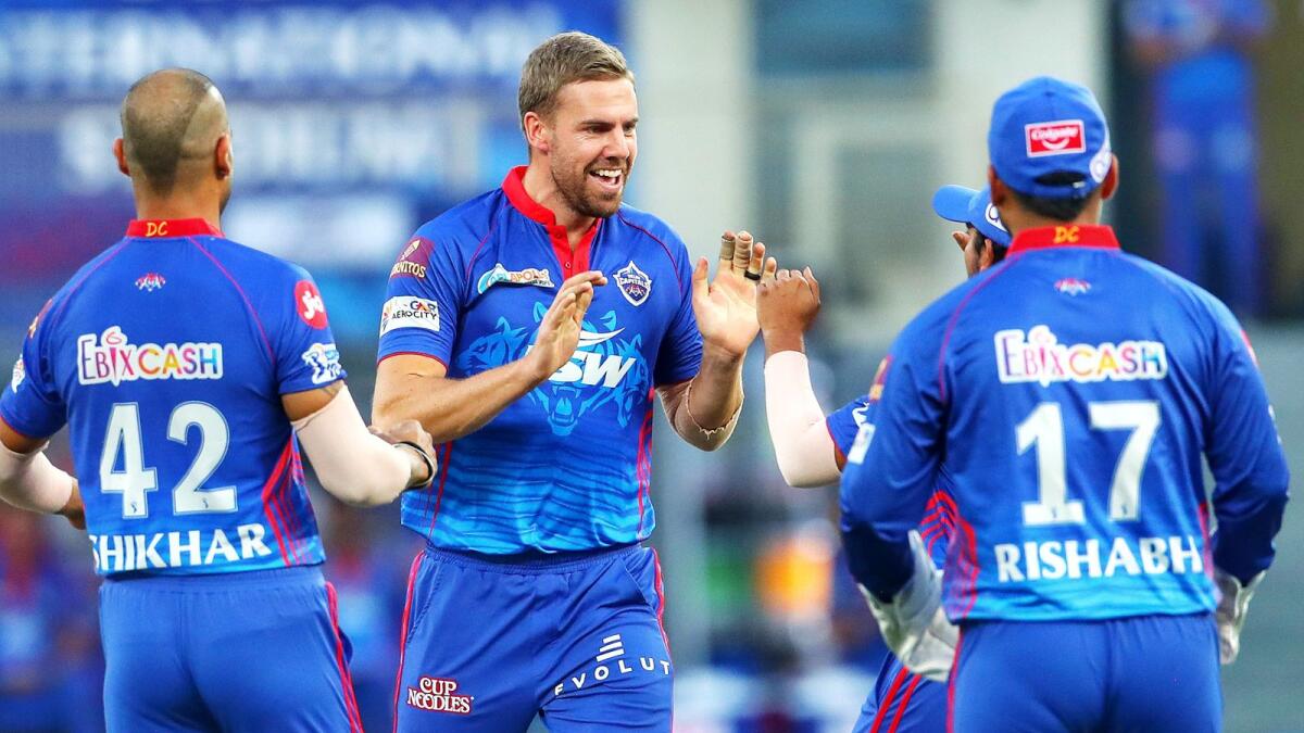 Anrich Nortje of Delhi Capitals celebrates the wicket of David Warner of Sunrisers Hyderabad with teammates. (ANI)