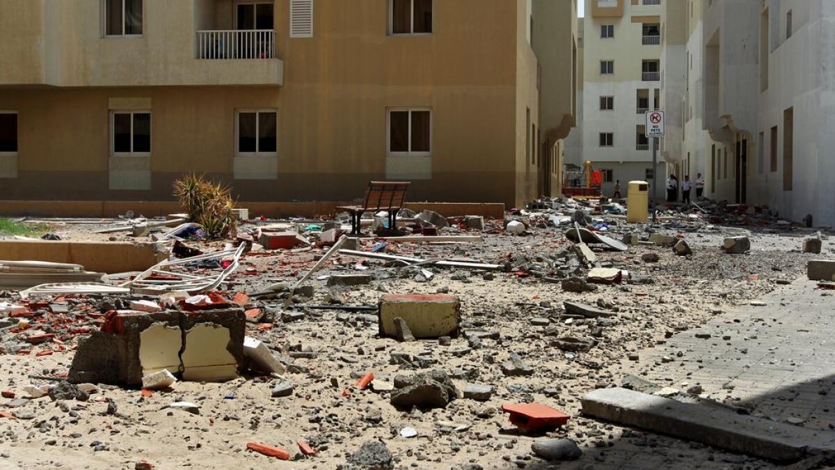 View of the debris and damages after the blast in building 39 of the Al Khail Gate in Al Quoz area