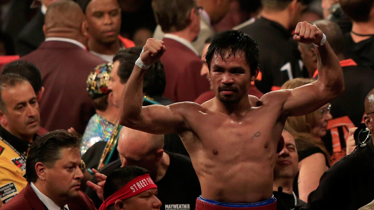 Manny Pacquiao is one among the prominent list of boxers not considering a shy at the Olympics. — AFP file