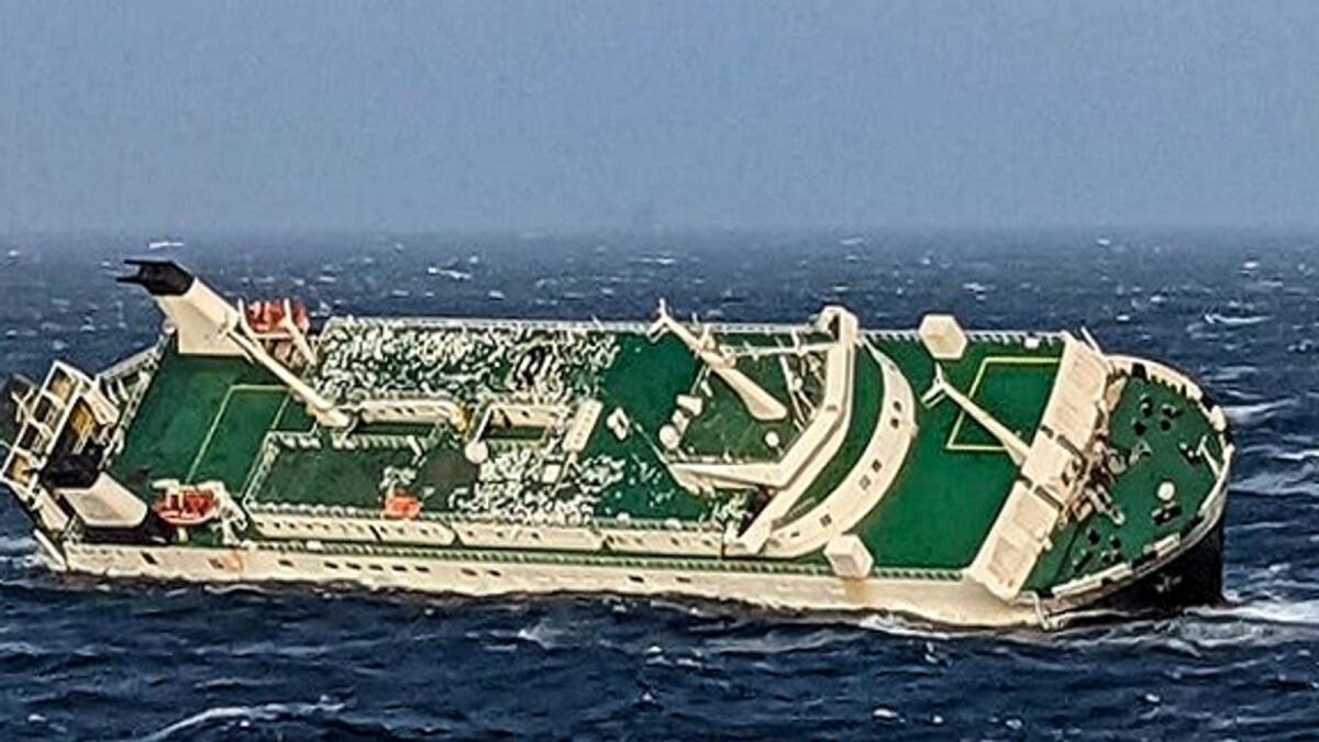 A handout picture provided by the Ports and Maritime Organization of Iran on March 17, 2022, reportedly shows an Emirati cargo ship sinking nearly 50km (30 miles) from the port of Asaluyeh in southern Iran. Photo: AFP