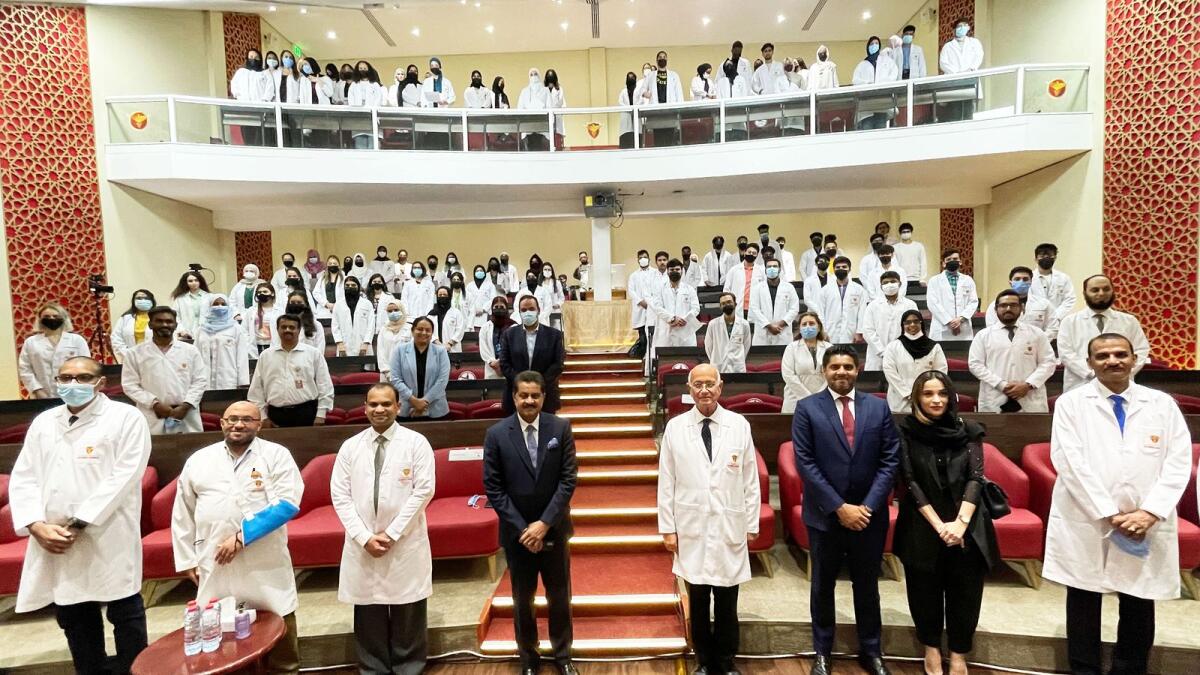 Dr Thumbay Moideen, Founder, President of Thumbay Group Board of Trustees, GMU, Prof Hossam Hamdy, Chancellor, GMU, Dr Pr Vice-Chancellors Academic along with other attendees at the White Coat Ceremony. Supplied photo