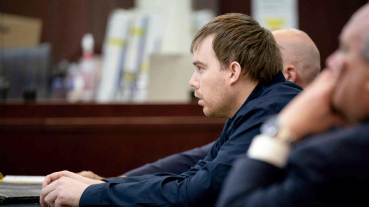 Travis Reinking listens to the closing rebuttal during his trial at the Justice A.A. Birch Building in Nashville. — AP