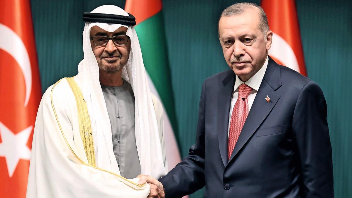 His HIghness Sheikh Mohamed bin Zayed Al Nahyan, Crown Prince of Abu Dhabi and Deputy Supreme Commander of the UAE Armed Forces, with H.E. Recep Tayyip Erdoğan, President of the Republic of Türkiye, as they attend a signing ceremony regarding the agreementsbetween the two countries at the Presidential Complex in Ankara on November 24, 2021. — AFP