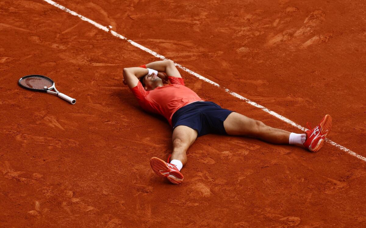 Serbia's Novak Djokovic celebrates after winning the final against Norway's Casper Ruud. — Reuters