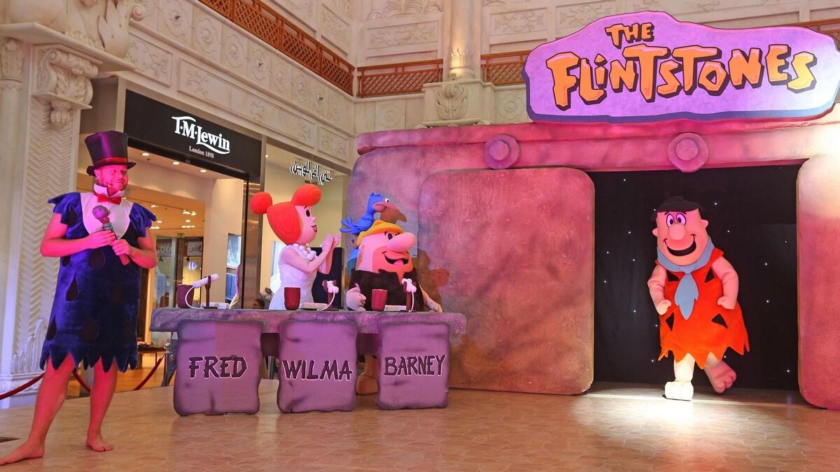 Cast of the Flintstones entertains crowd at Ibn Battuta Mall as part of the Dubai Summer Surprises on Sunday. (KT photo by Dhes Handumon)