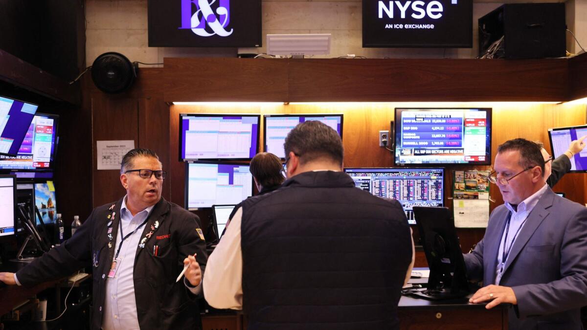 Traders at the New York Stock Exchange. — AFP