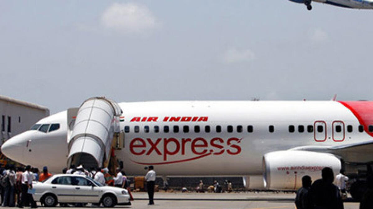 Free rebooking, UAE-bound, passengers, API approval, Air India Express