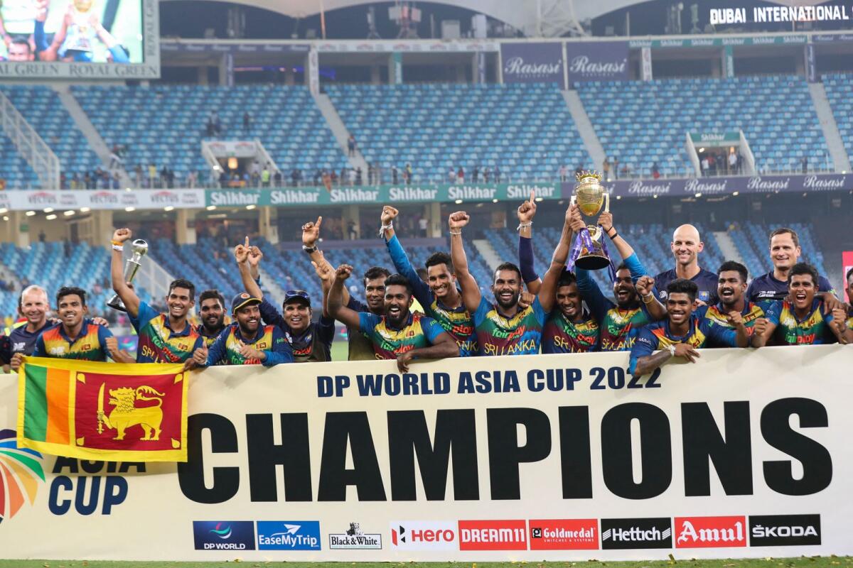 Sri Lanka celebrate with the trophy after winning the Asia Cup at the Dubai International Cricket Stadium last year. — AFP