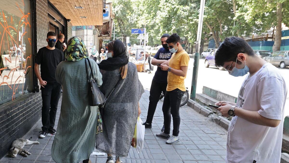 Iranians pictured in northern Tehran ahead of the presidential elections. Photo: AFP