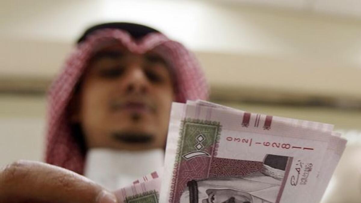 Saudi riyal will retain dollar peg