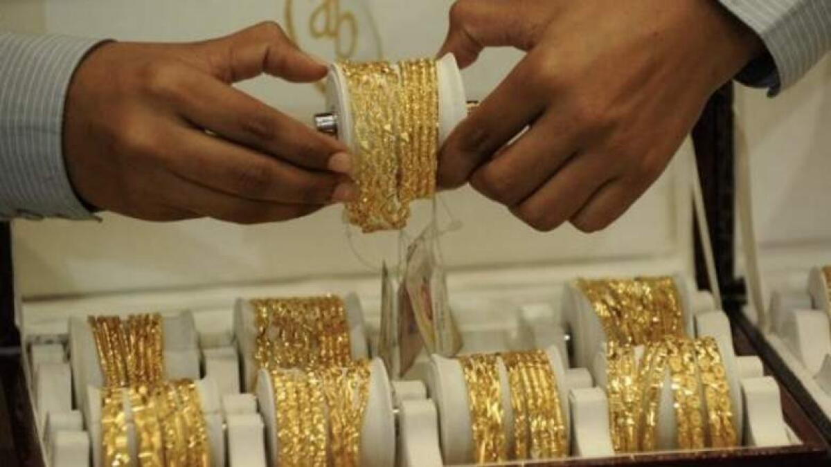 Dubai gold prices fall as dollar firms, Dh136.25 for 22k  