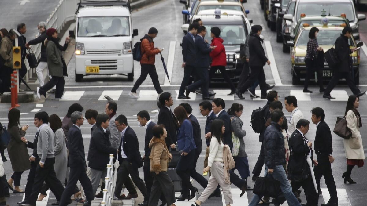 Japan business sentiment flat as trade tensions weigh