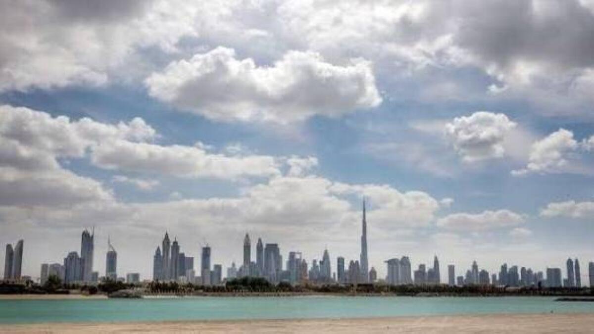 UAE, weather, fair to partly cloudy, chance, rain, National Center of Meteorology, winds, blowing, sand, dust