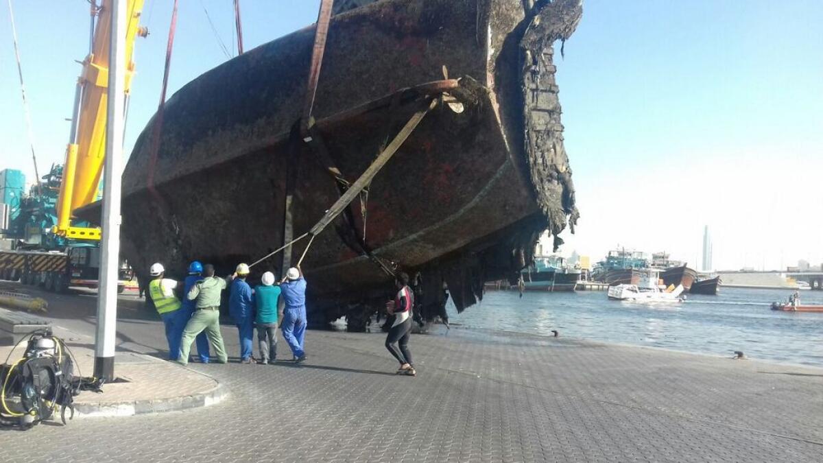 Two sunken dhows recovered in Dubai Creek