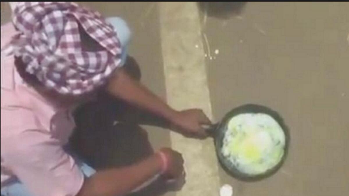 Video: Man cooks egg on road amid intense heat 