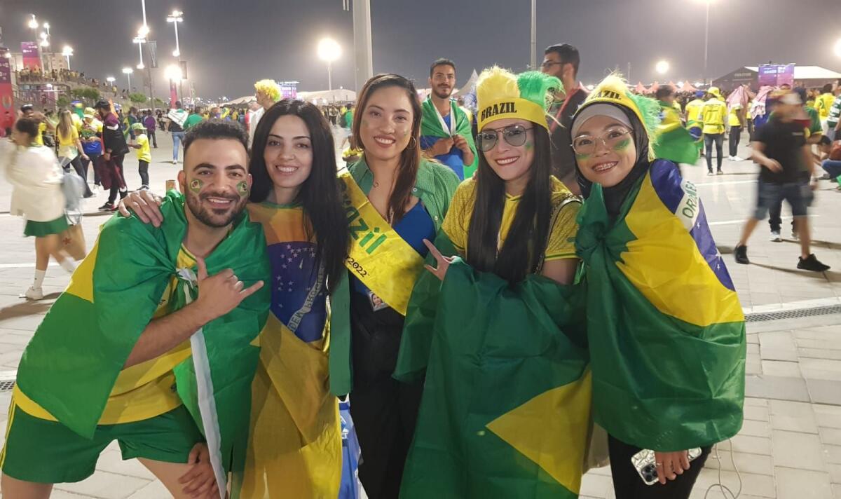 Sam (left) and Sana with Filipino fans Shine, Nachi and Saffra who support Brazil. – Rituraj Borkakoty