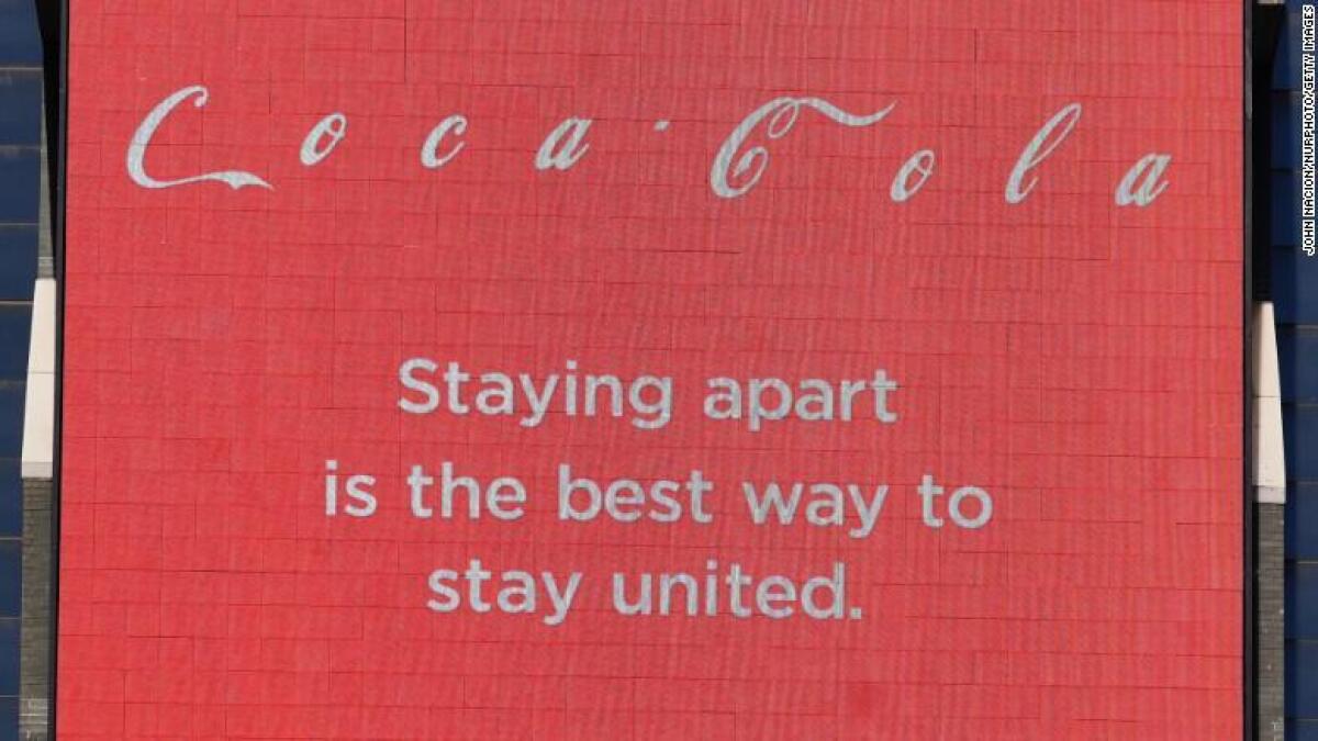 Coca-Cola's billboard in Times Square is promoting 'Social Distancing' to curb the coronavirus outbreak. The advert shows each letter of its logo separated with the slogan 'Staying apart is the best way to stay connected.'