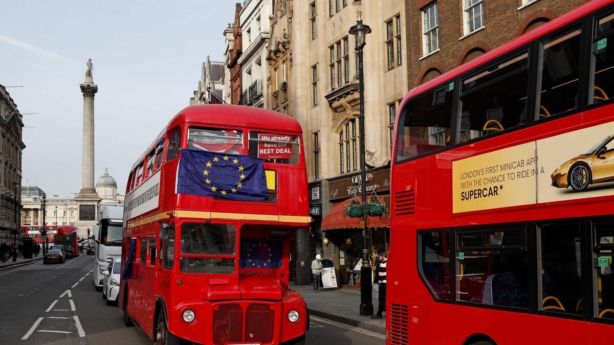 Another icon bites the dust: Londons famous red bus maker slams the brakes