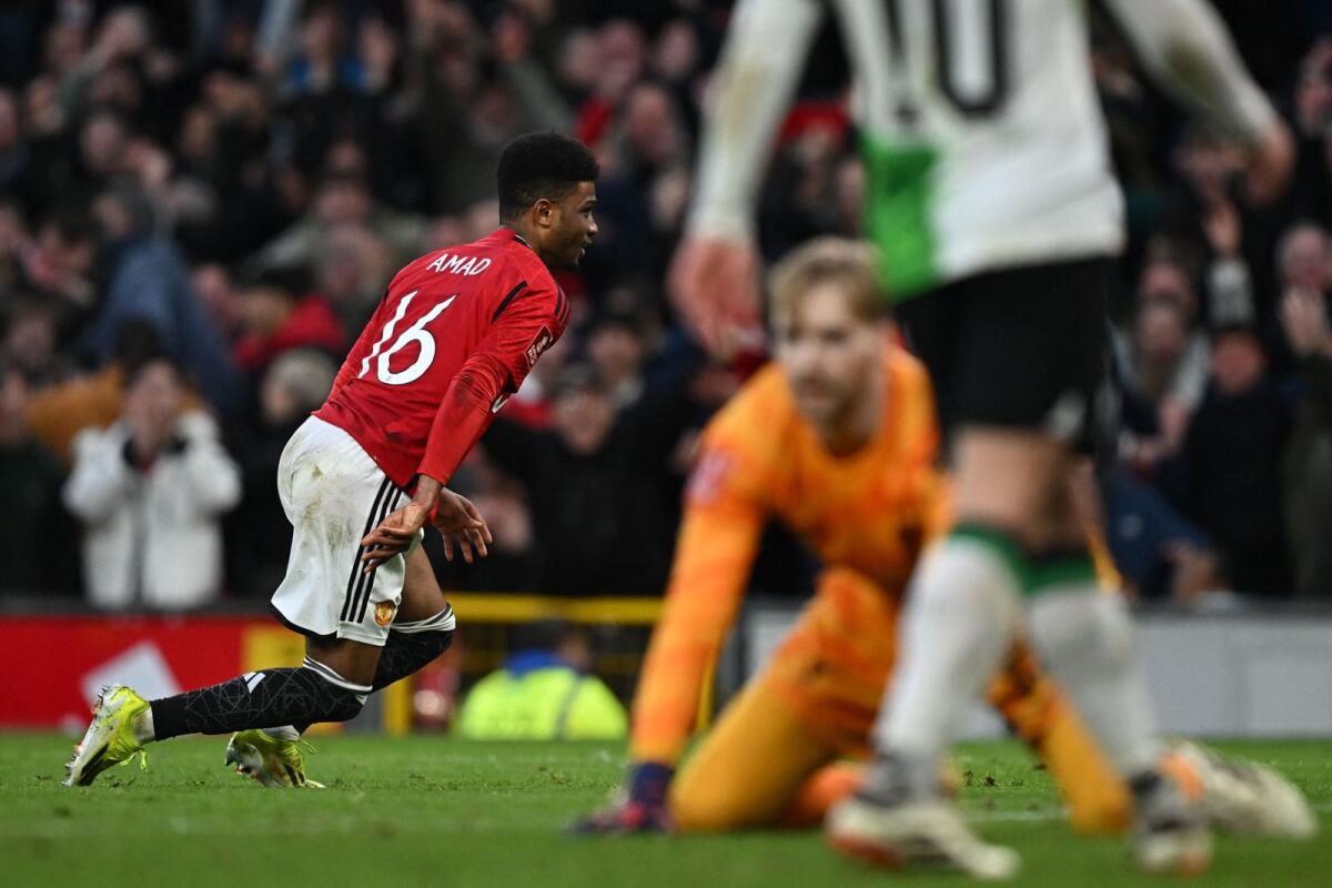 Manchester United midfielder Amad Diallo celebrate after scoring the winning goal. — AFP