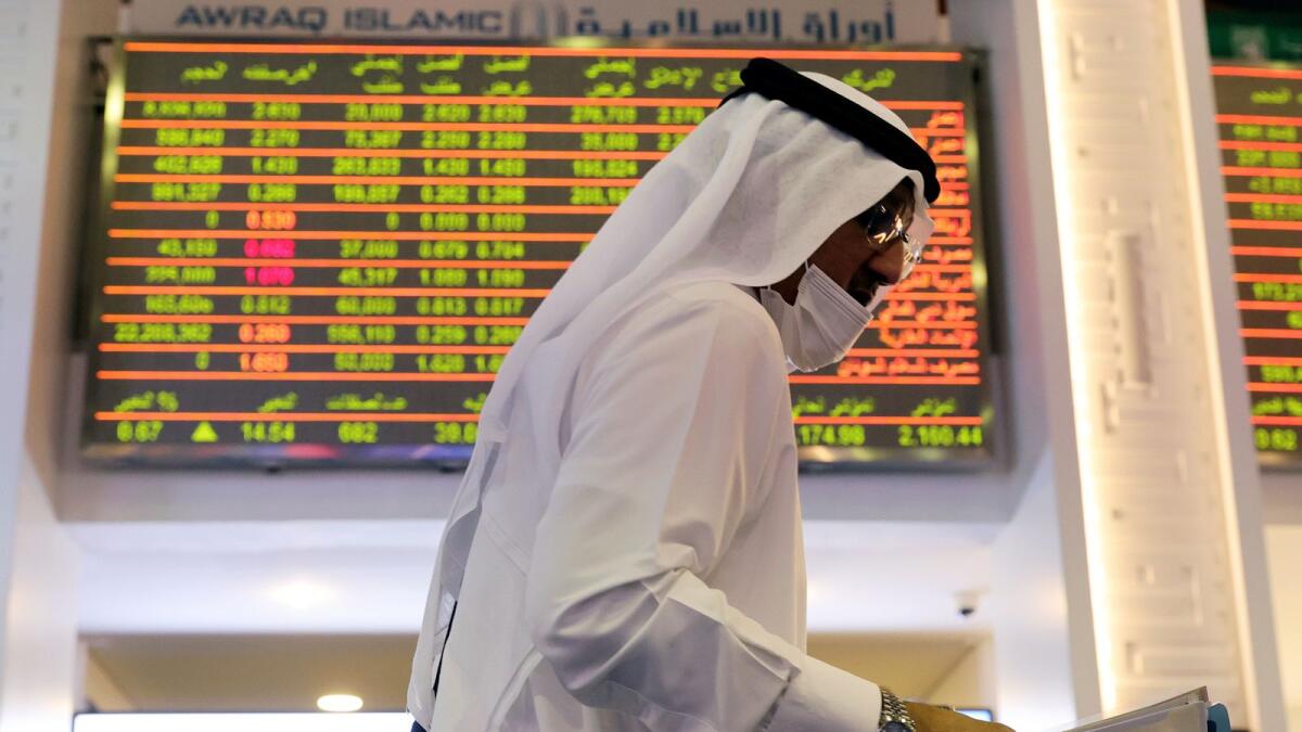 An investor walks through the Dubai Financial Market. Dubai’s main share index surged 0.92 per cent or 29.15 points, to 3,170.13 points, hitting its highest level since March 2018. — Reuters file photo